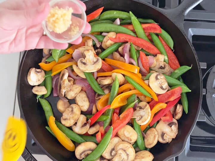 Adding garlic and ginger.