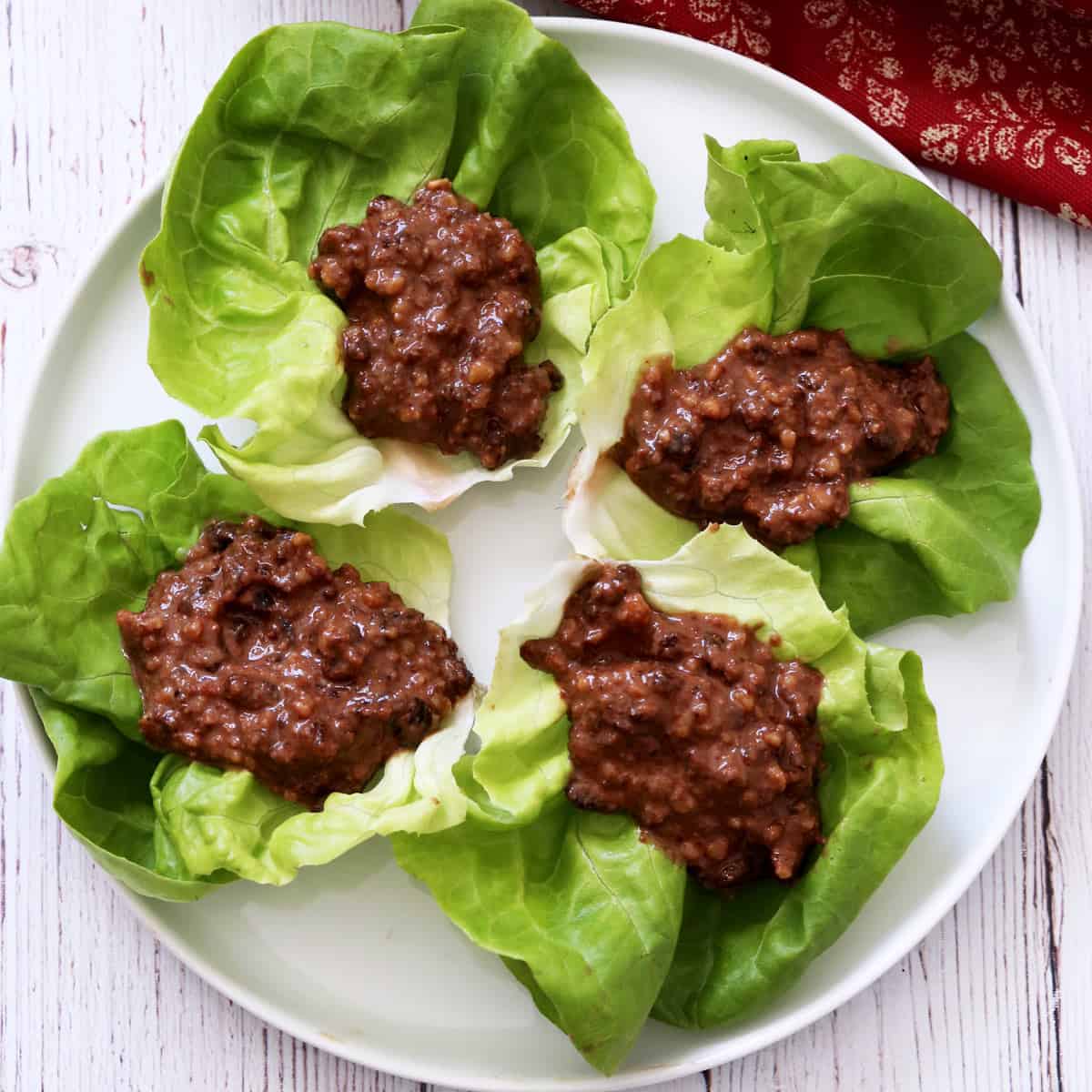 Charoset is served on lettuce leaves.