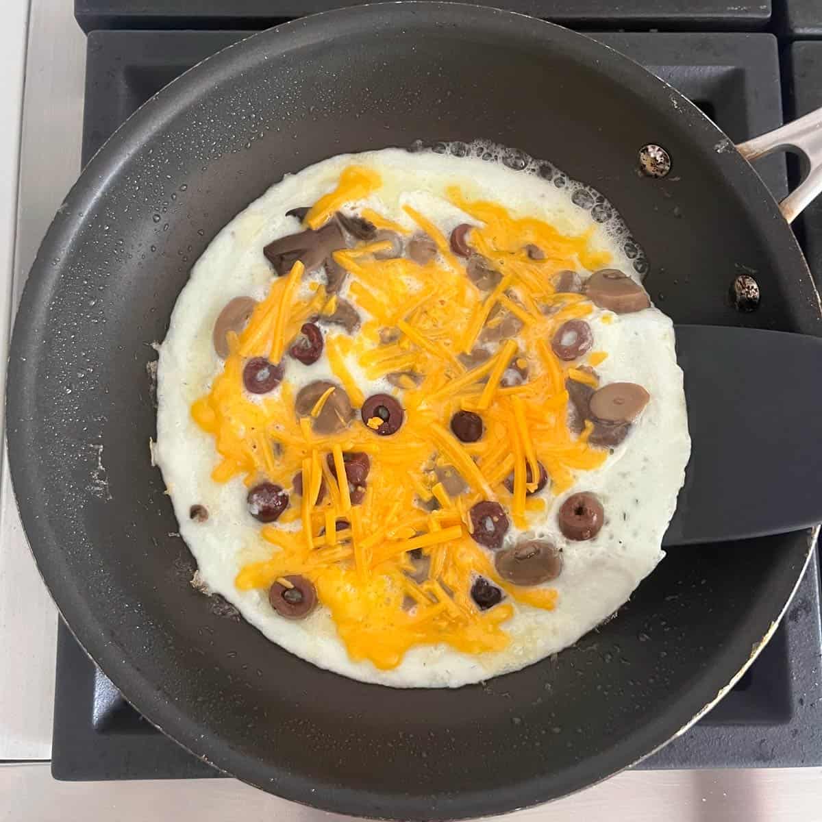 Folding the omelette.