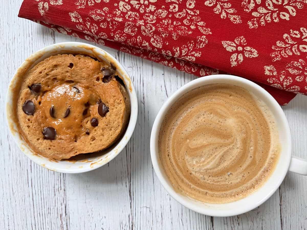 Peanut butter mug cake is served with coffee.