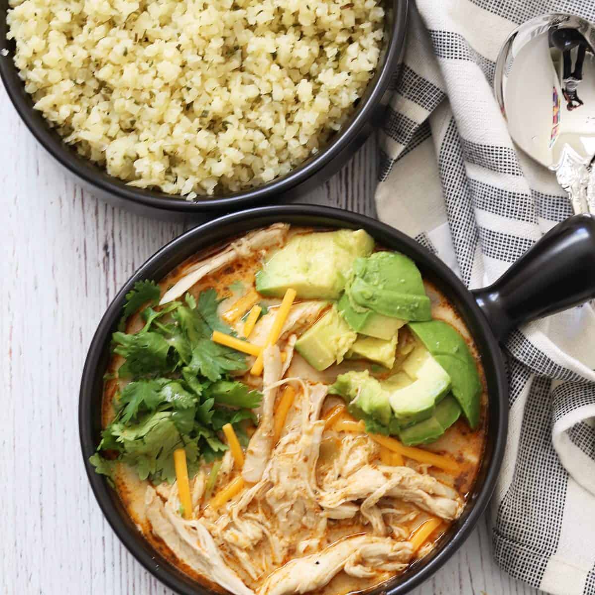 Chicken chili is served with cauliflower rice.