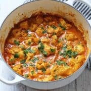 Thai chicken curry is served in a white stockpot.