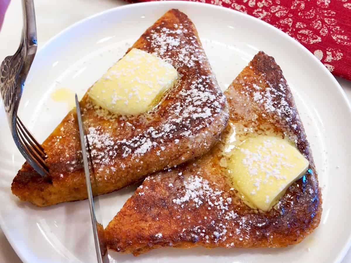 Keto French toast is served on a white plate.