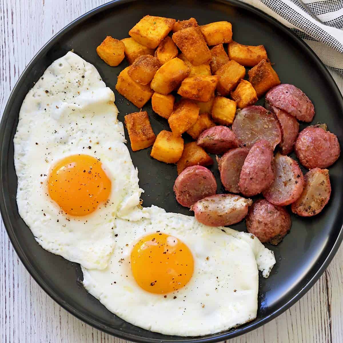 Roasted radishes and pumpkin leftovers are served with fried eggs.