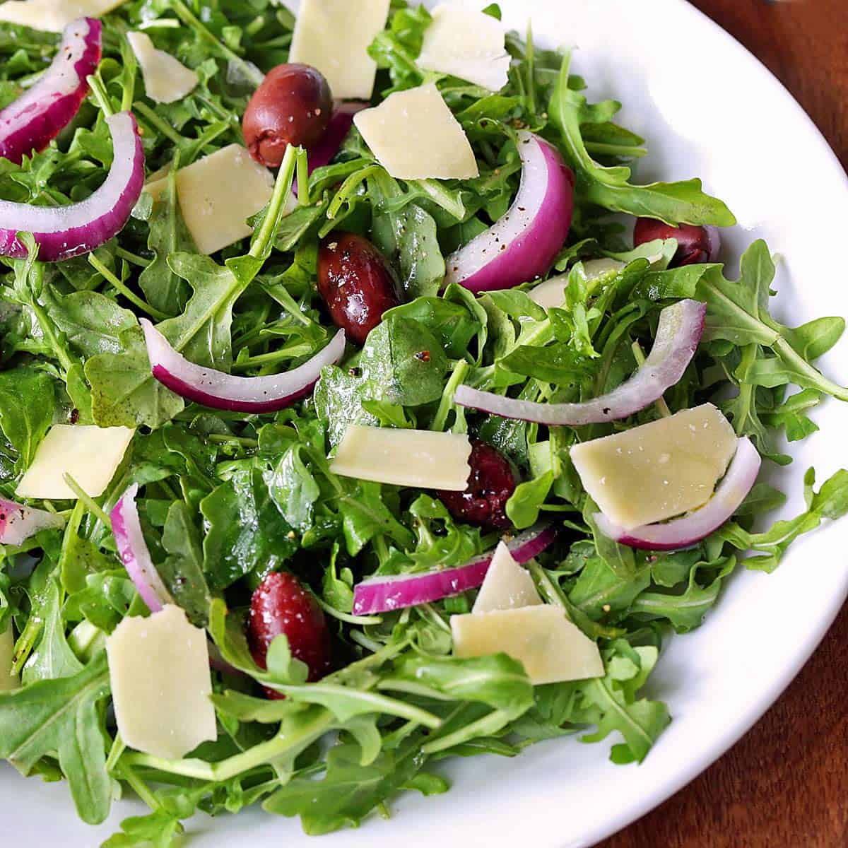Arugula salad without tomatoes.