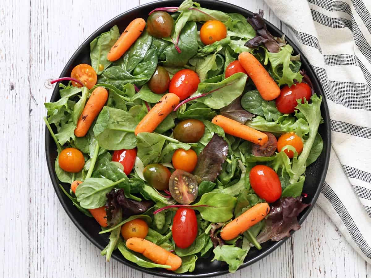 Glazed carrots leftovers were added to a salad.