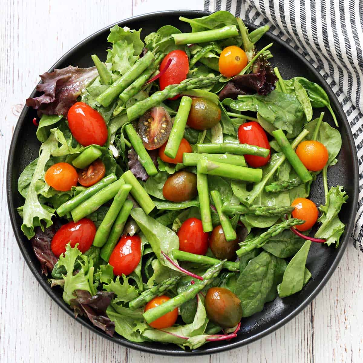 Microwave asparagus leftovers were added to a salad.