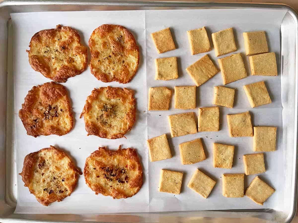 Reheating almond flour crackers and cheese chips in a pan.