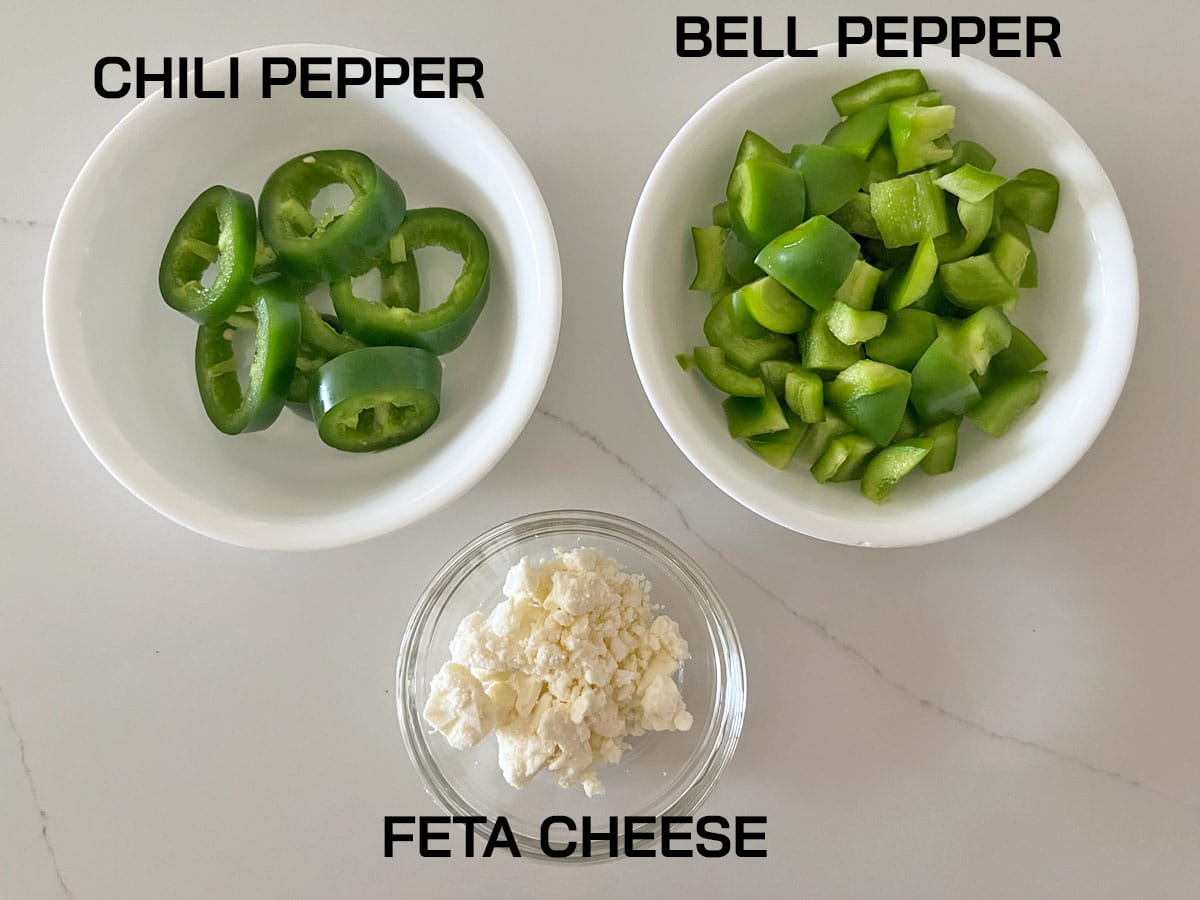 Optional ingredients for shakshuka: bell pepper, chili pepper, and feta cheese.