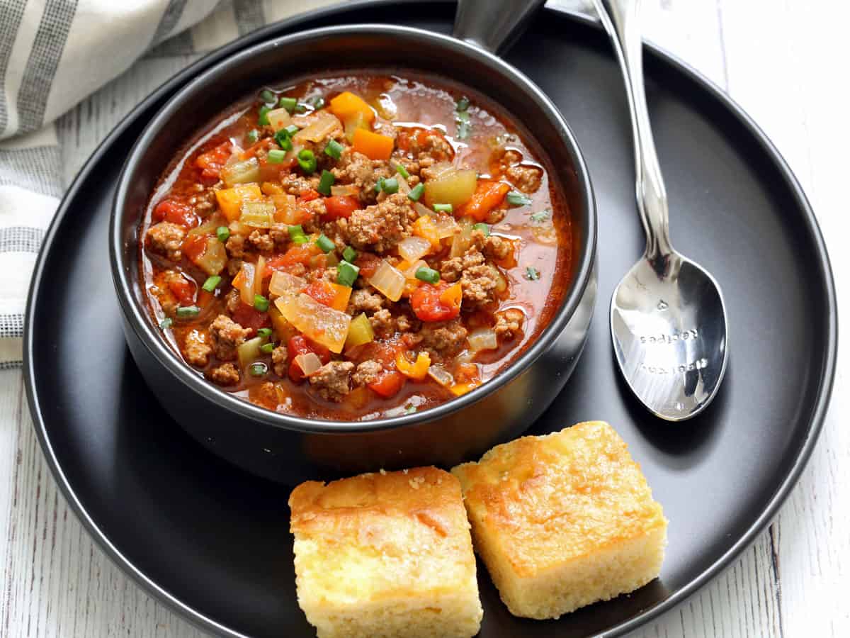 Cornbread is served with hamburger soup.