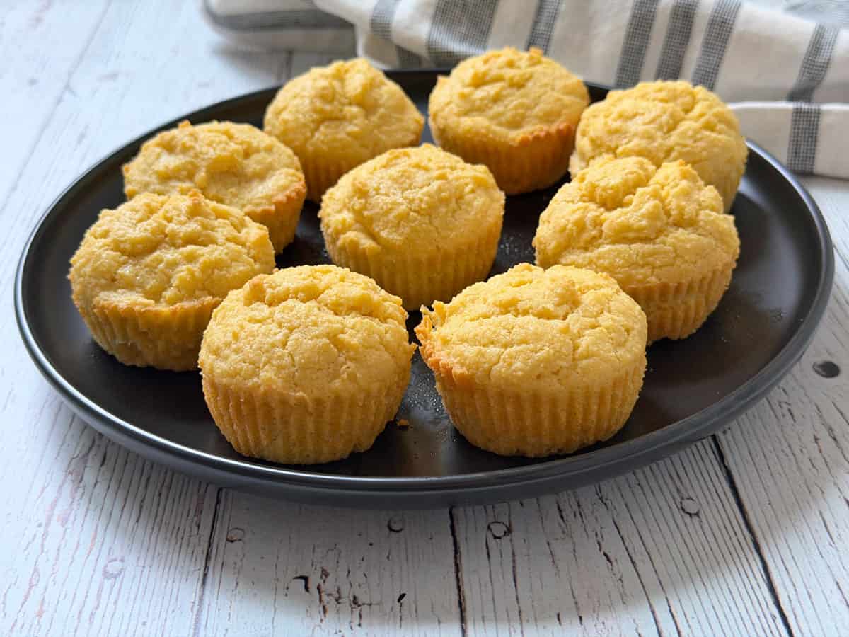 Keto cornbread muffins on a plate.