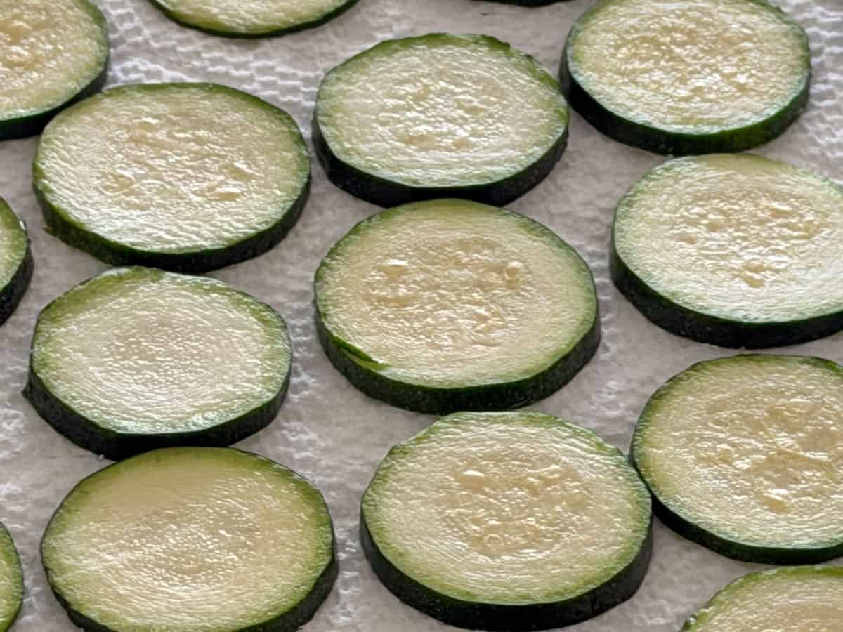 The zucchini slices were blotted dry.