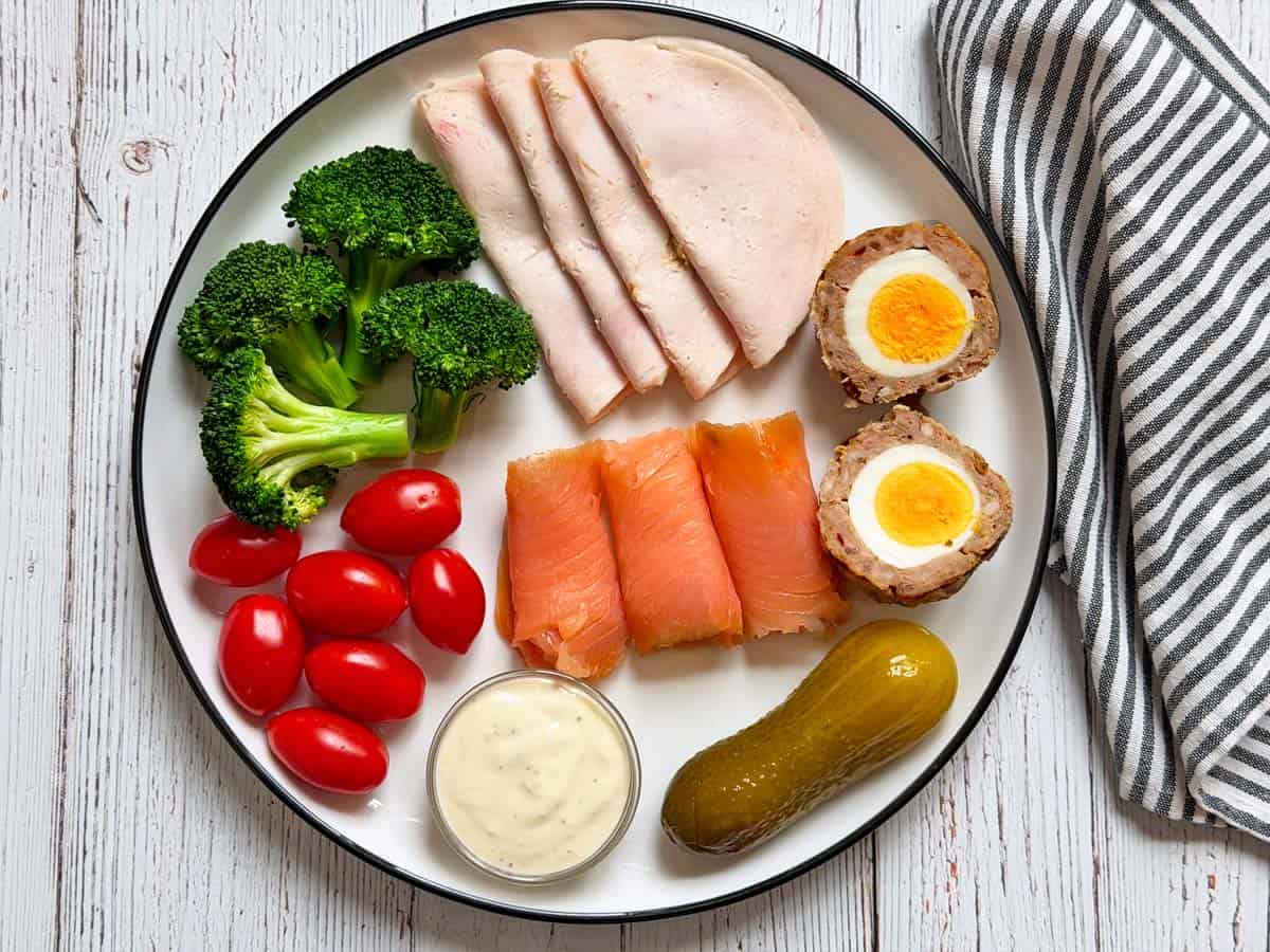 Microwave broccoli is served as part of a charcuterie plate.