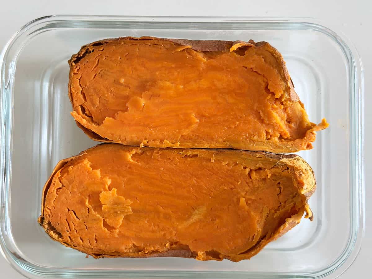 Microwave sweet potato leftovers are kept in a glass container.