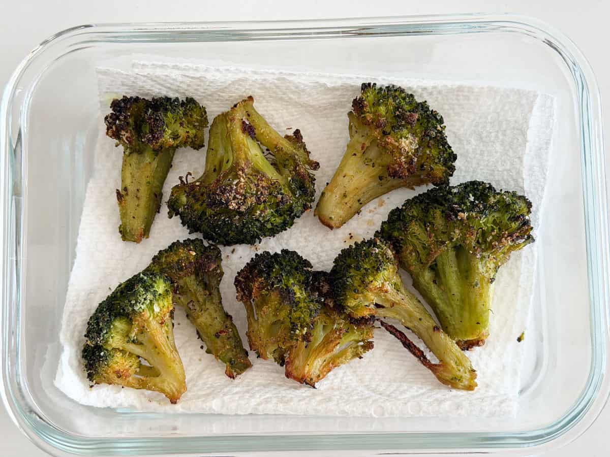 Storing leftovers of roasted frozen broccoli.