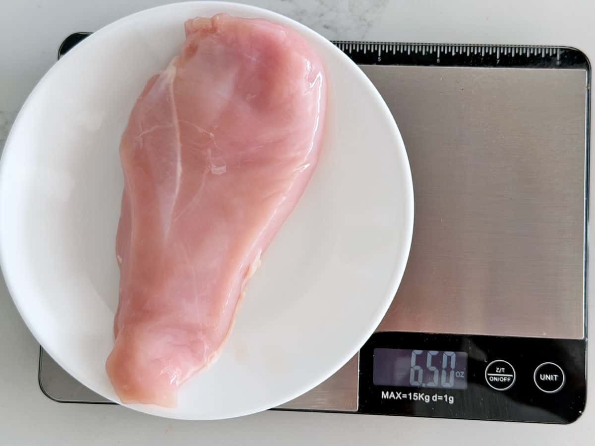 A small chicken breast weighing 6.5 ounces.
