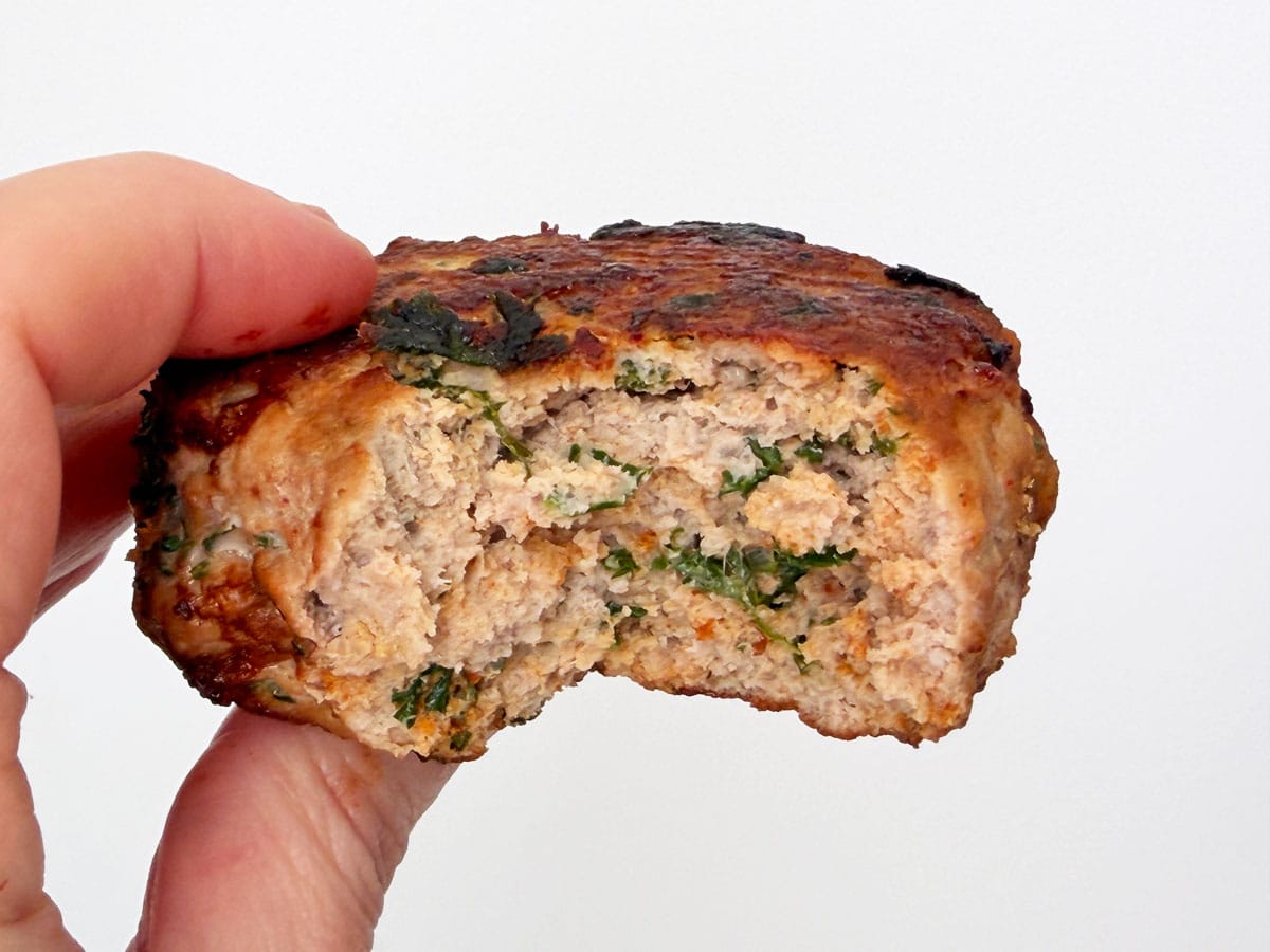 Showing the inside of a turkey burger.