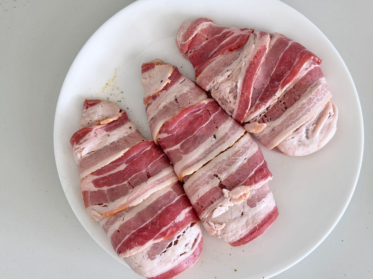 The chicken was wrapped in bacon.