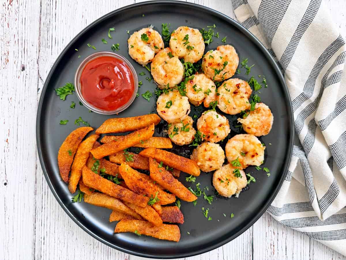 Baked shrimp are served with jicama fries.
